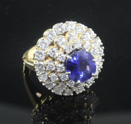 An 18ct gold, platinum and iridium, sapphire and diamond set dress ring, size N.
